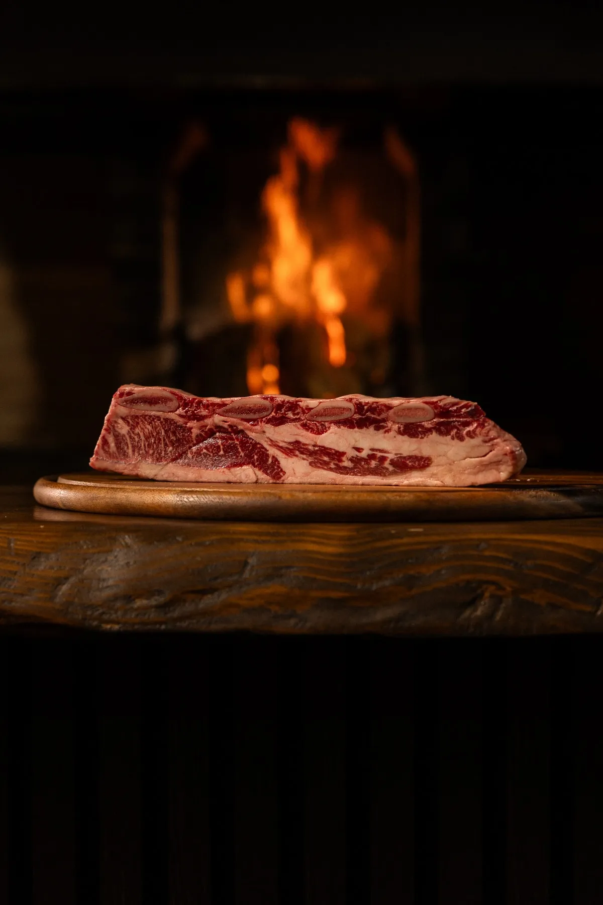 Asado de tira sulla brace di legna